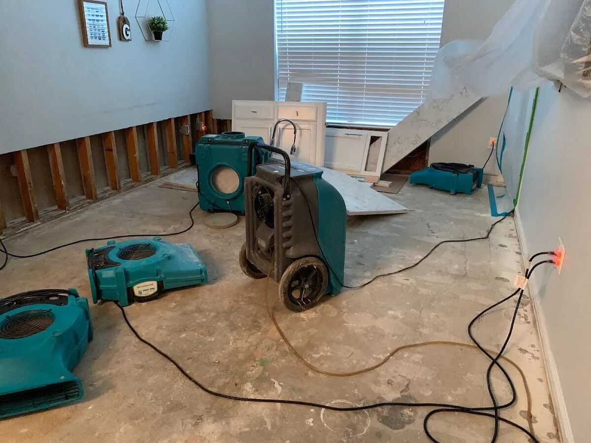 Dehumidifier in flood-cut room for Water Damage Restoration in Newark